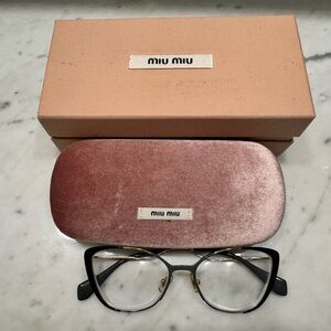 MiuMiua Brand name glasses frame.  Glasses in pink glasses case. No brown box